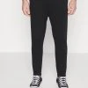 YOURTURN UNISEX - Pantaloni Sportivi - Black -Sconto YOURTURN in Italia 2d400898b5204a93873bdc0ac1141f2d